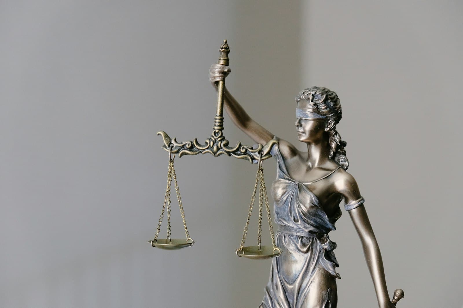 Attorney in business attire at a modern law office desk, capturing consultation requests