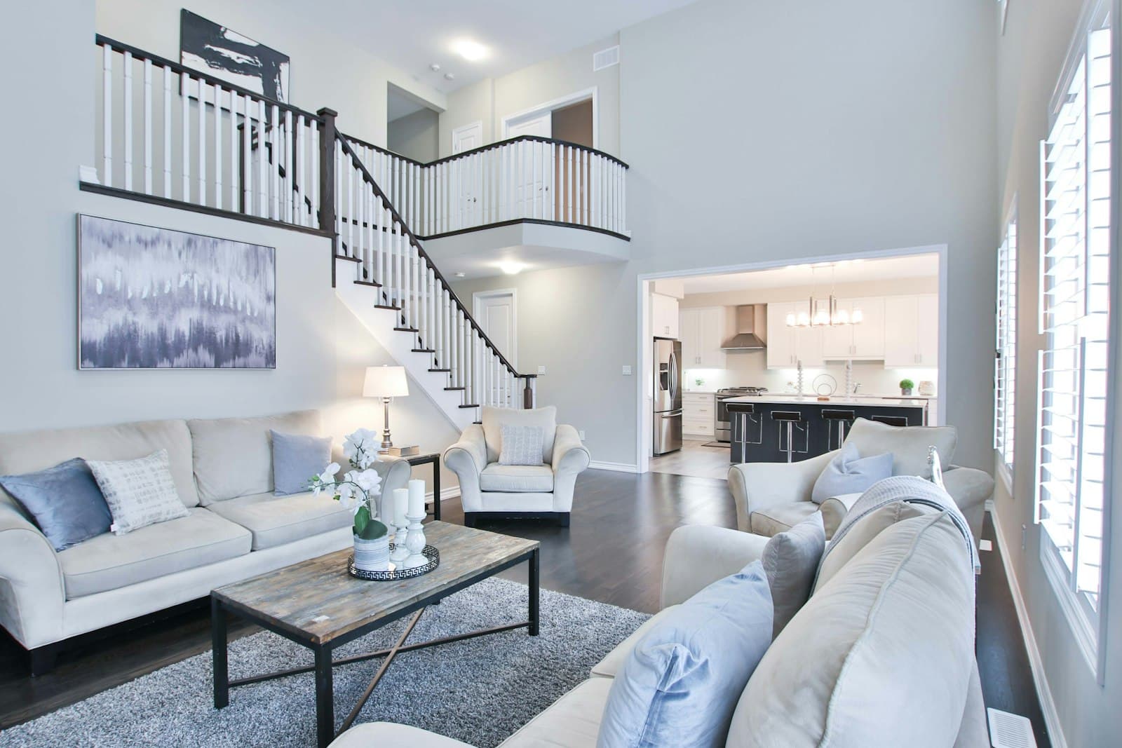 Contractor reviewing plans with a homeowner in a renovation site, qualifying leads on autopilot
